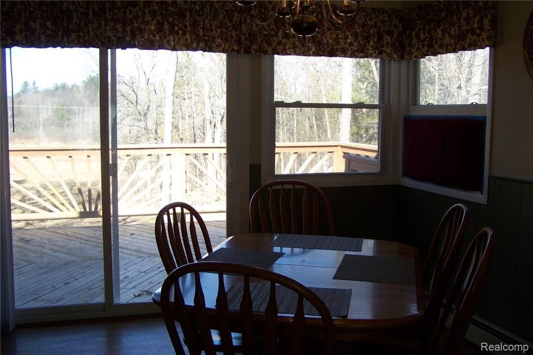 4848 Vines Road Howell, MI 48843 - Photo 7 of 32 DINING TO DOORWALL TO BACK DECK