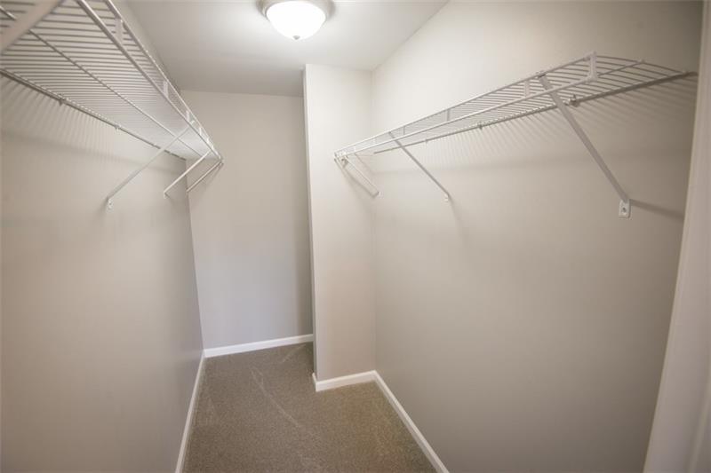 218 McClure Road Cheswick, PA 15024 - Photo 12 of 25 10 foot deep master bedroom closet (behind half wall) is additional shelving.