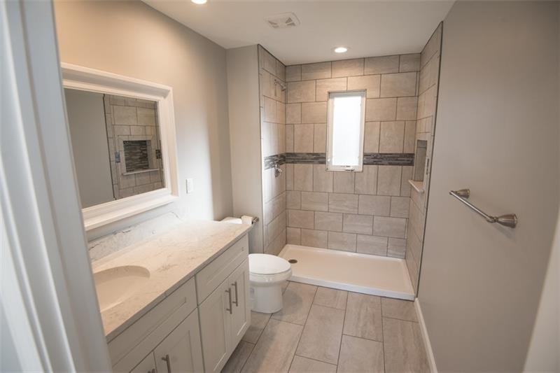 218 McClure Road Cheswick, PA 15024 - Photo 13 of 25 Master bathroom with 5 foot walk in shower and large vanity with lots of counter space.