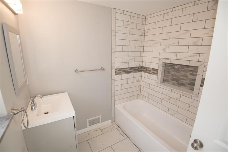 218 McClure Road Cheswick, PA 15024 - Photo 16 of 25 Another brand new bathroom with lots of ceramic!