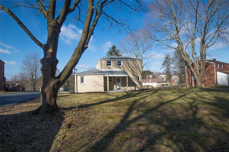 218 McClure Road Cheswick, PA 15024 - Photo 24 of 25 Fantastic flat level yard with covered patio overlooking the rear yard.