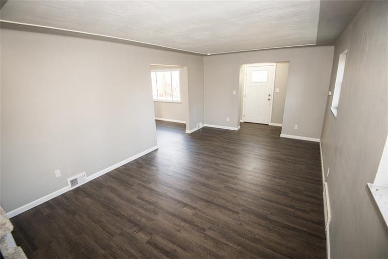 218 McClure Road Cheswick, PA 15024 - Photo 4 of 25 View of large living room from the stairs to second floor.