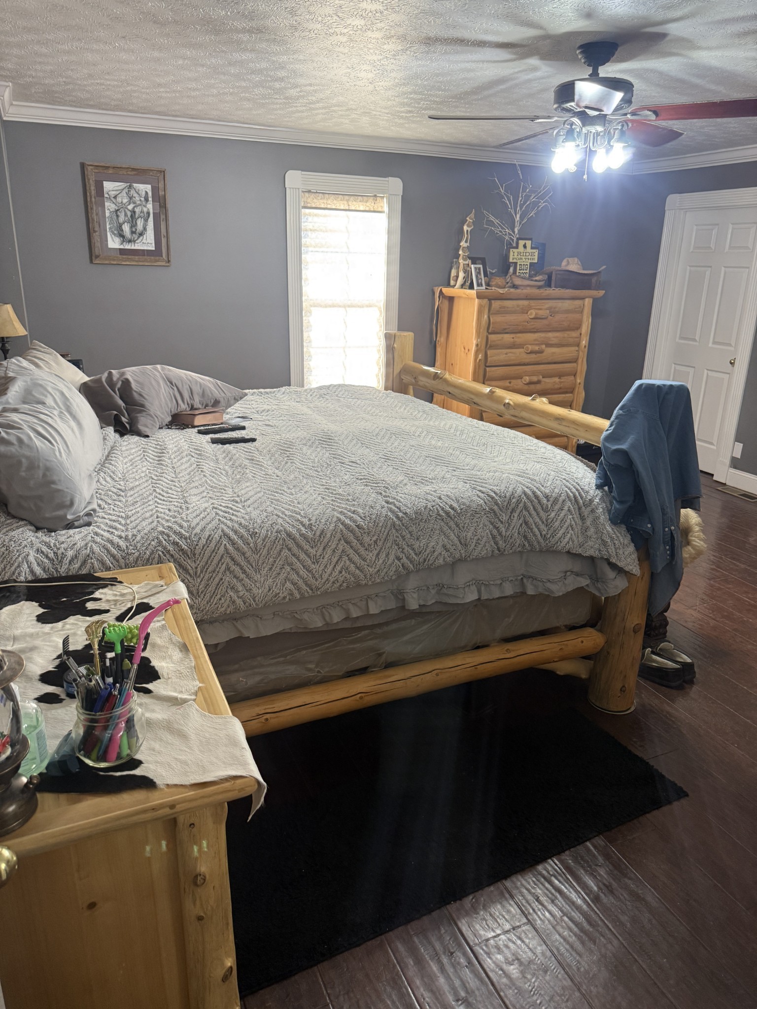 321 Bellview Road Waverly, TN 37185 - Photo 18 of 27 a bedroom with a bed and a dresser