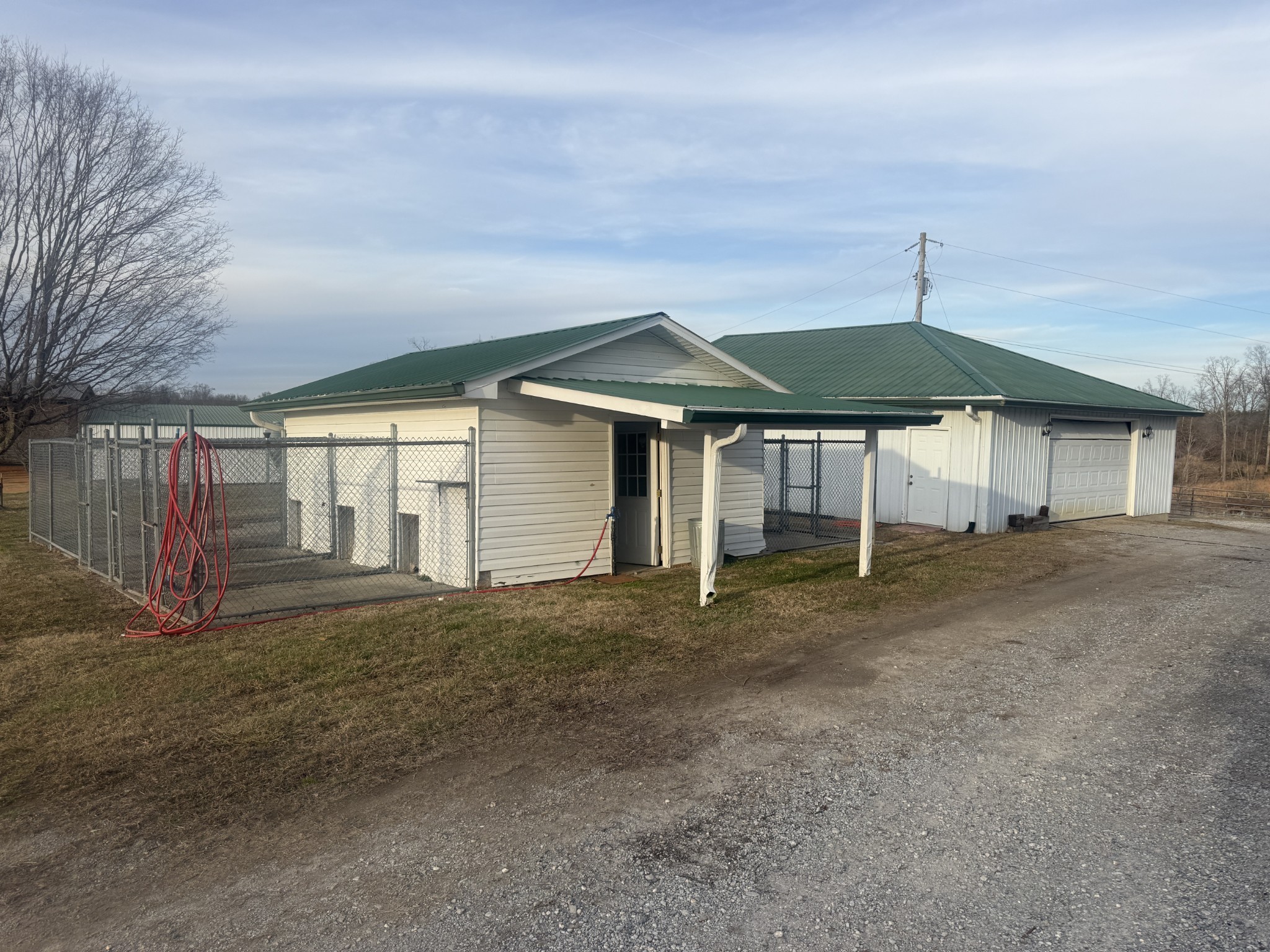 321 Bellview Road Waverly, TN 37185 - Photo 27 of 27 a view of a house with a yard and wooden fence