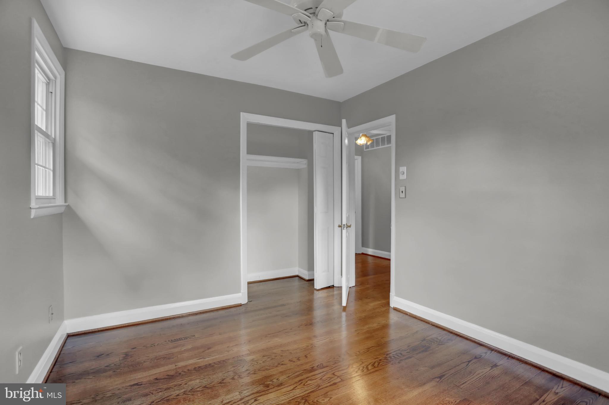 829 Kellogg Road Lutherville-Timonium, MD 21093 - Photo 25 of 42 wooden floor in an empty room with a window