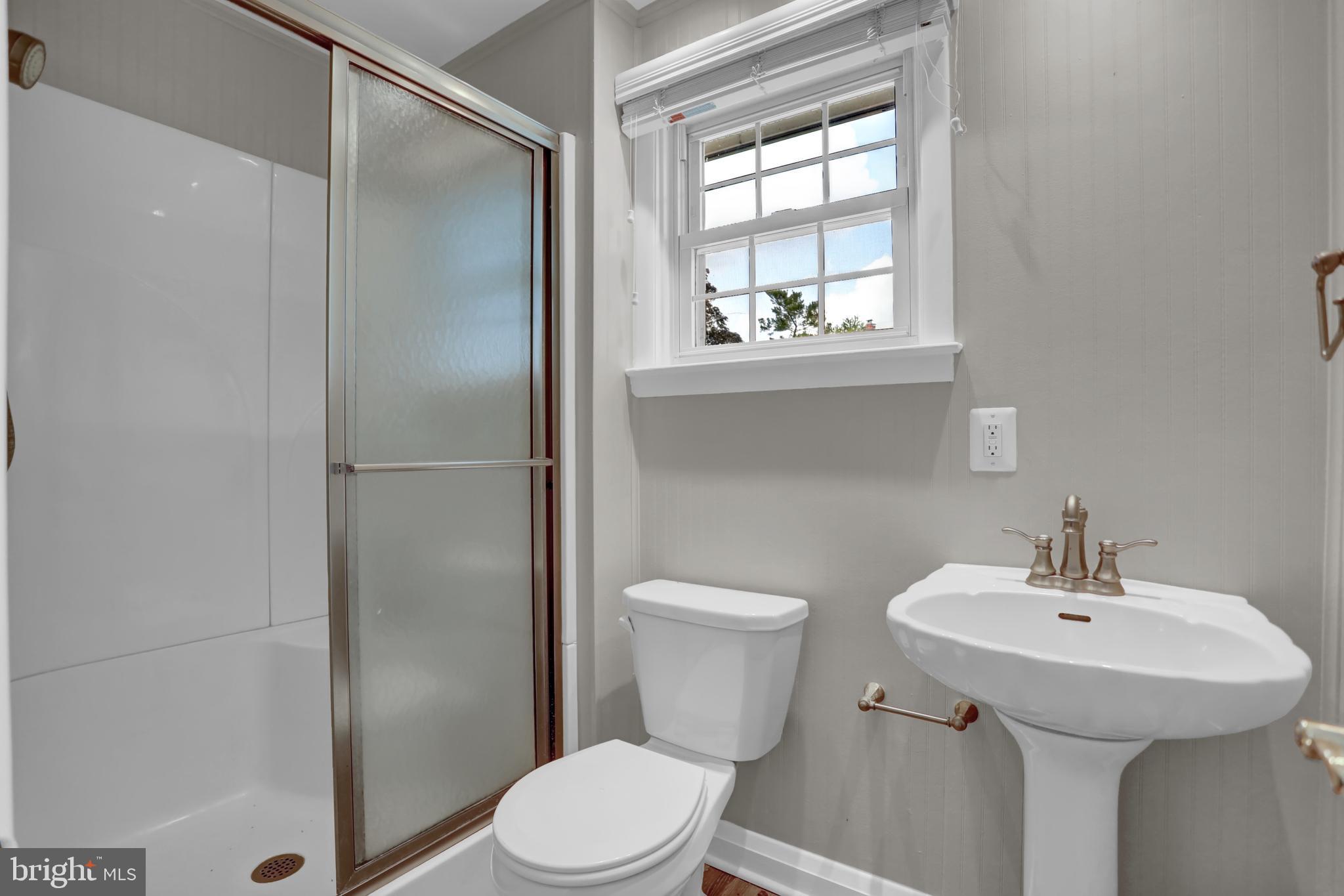 829 Kellogg Road Lutherville-Timonium, MD 21093 - Photo 28 of 42 a bathroom with a sink toilet and a shower