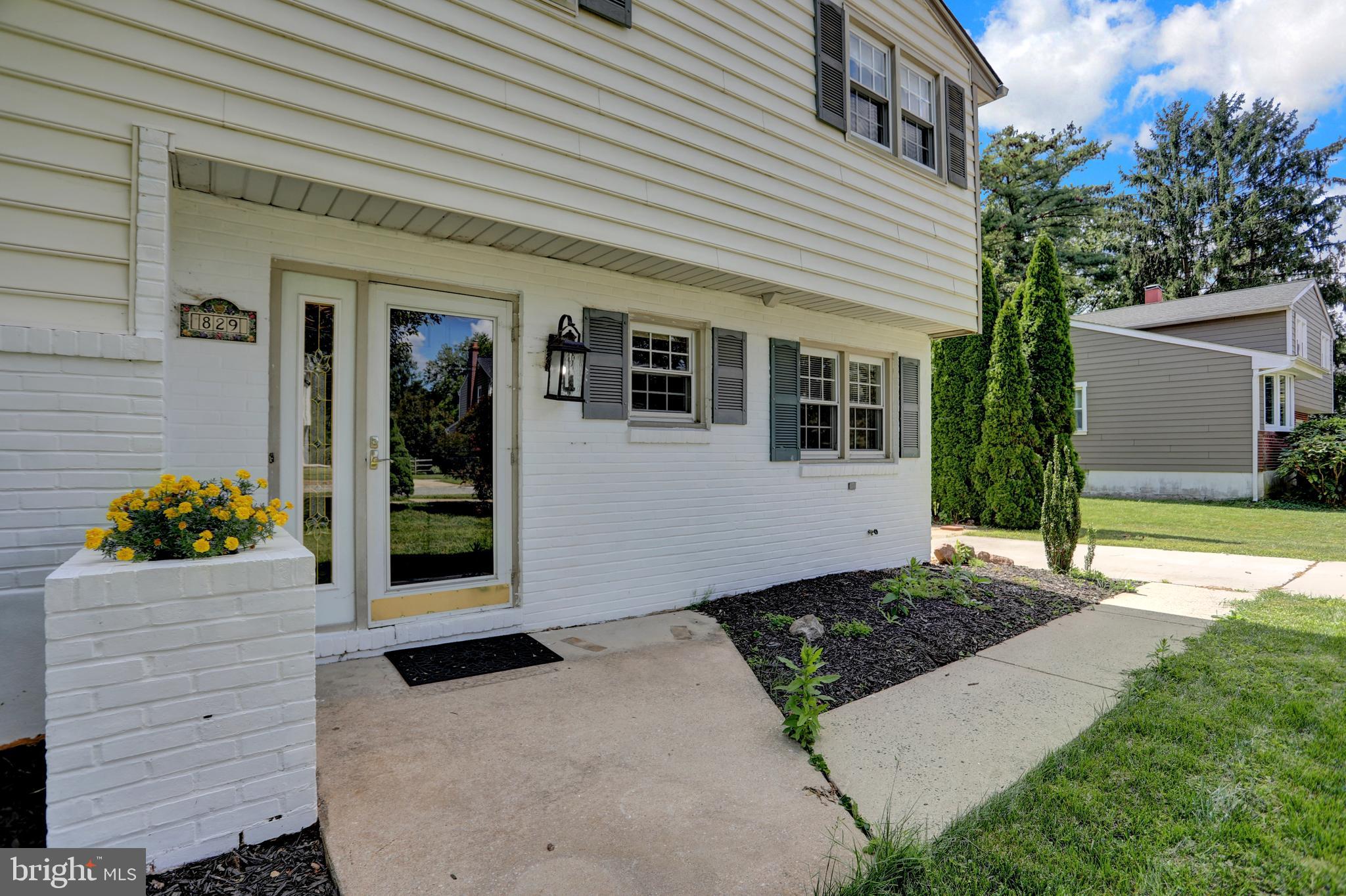 829 Kellogg Road Lutherville-Timonium, MD 21093 - Photo 38 of 42 a front view of a house with a yard