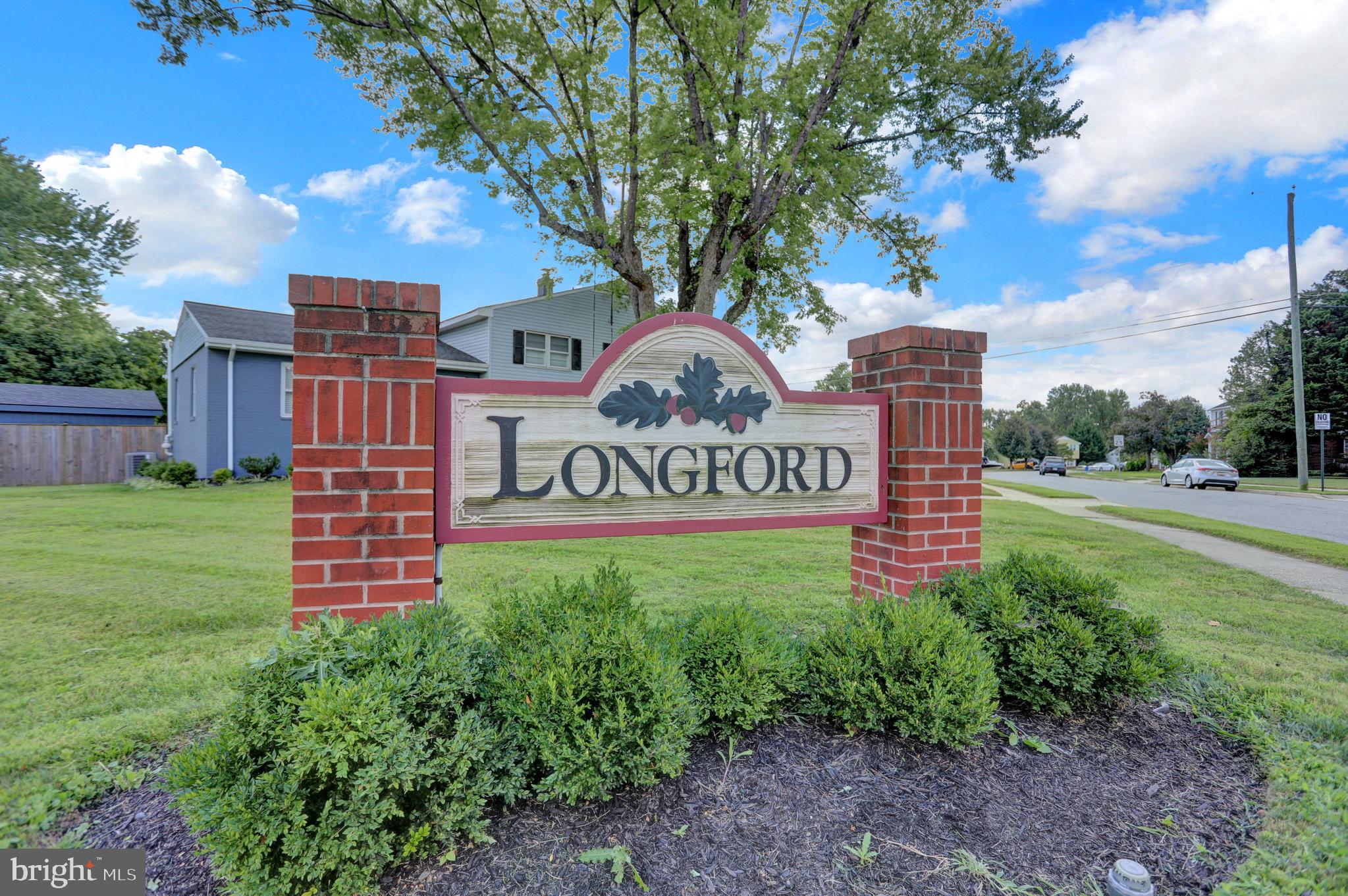 829 Kellogg Road Lutherville-Timonium, MD 21093 - Photo 40 of 42 a sign of golf club on a wall under a tree