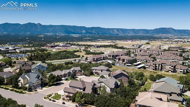 1052 Hummingbird Court Colorado Springs, CO 80921 - Photo 2 of 2 Just a sample of the views from the backyard. You can see the famous chapel of the US Air Force Academy in this image. You can see almost all of the Air Force Academy from the back deck!