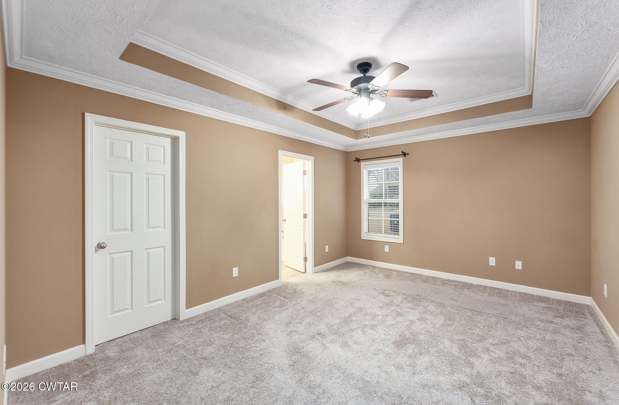 9 Sandbourne Cove Jackson, TN 38305 - Photo 11 of 22 a view of an empty room with a window