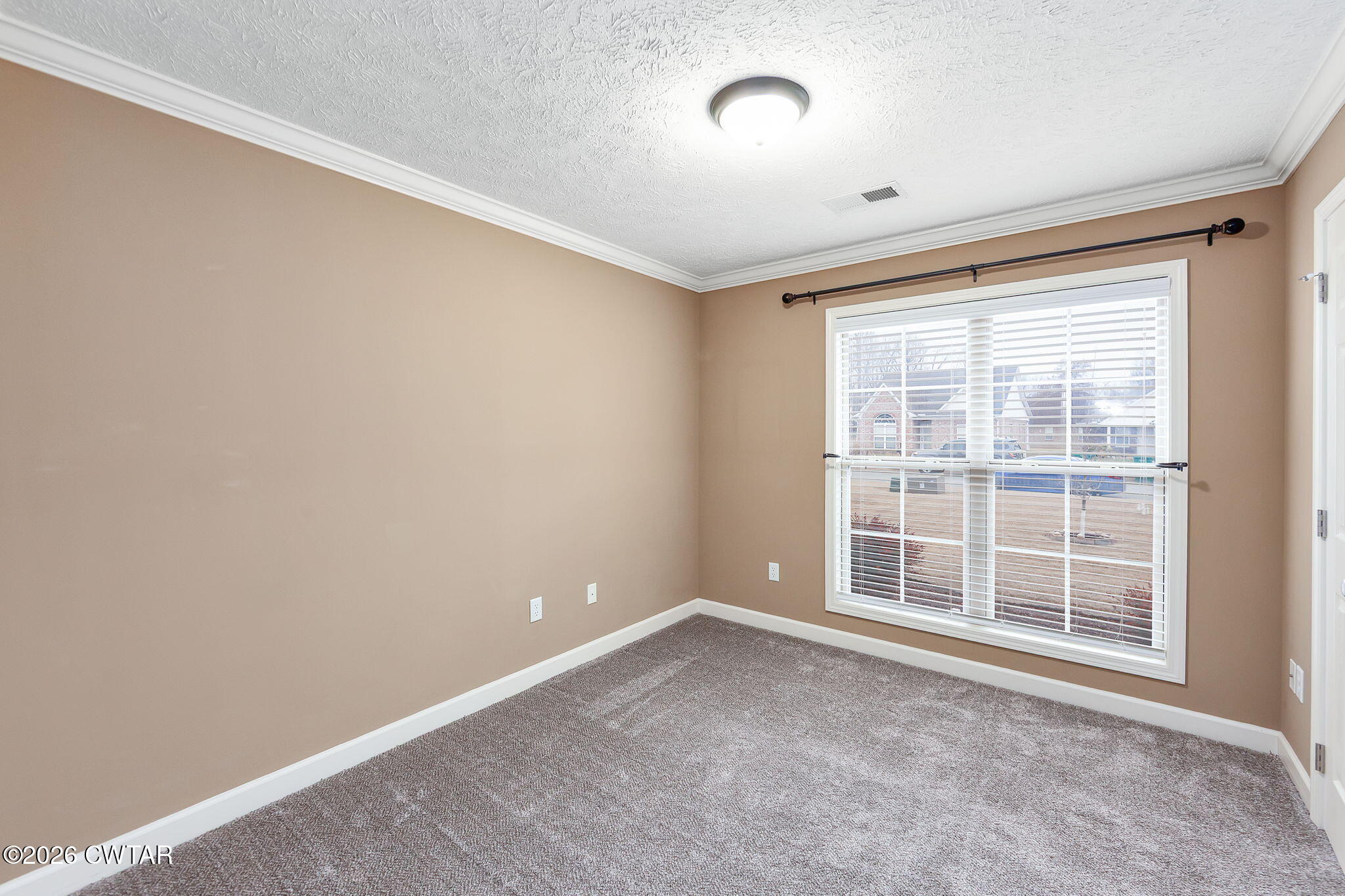 9 Sandbourne Cove Jackson, TN 38305 - Photo 13 of 22 an empty room with windows