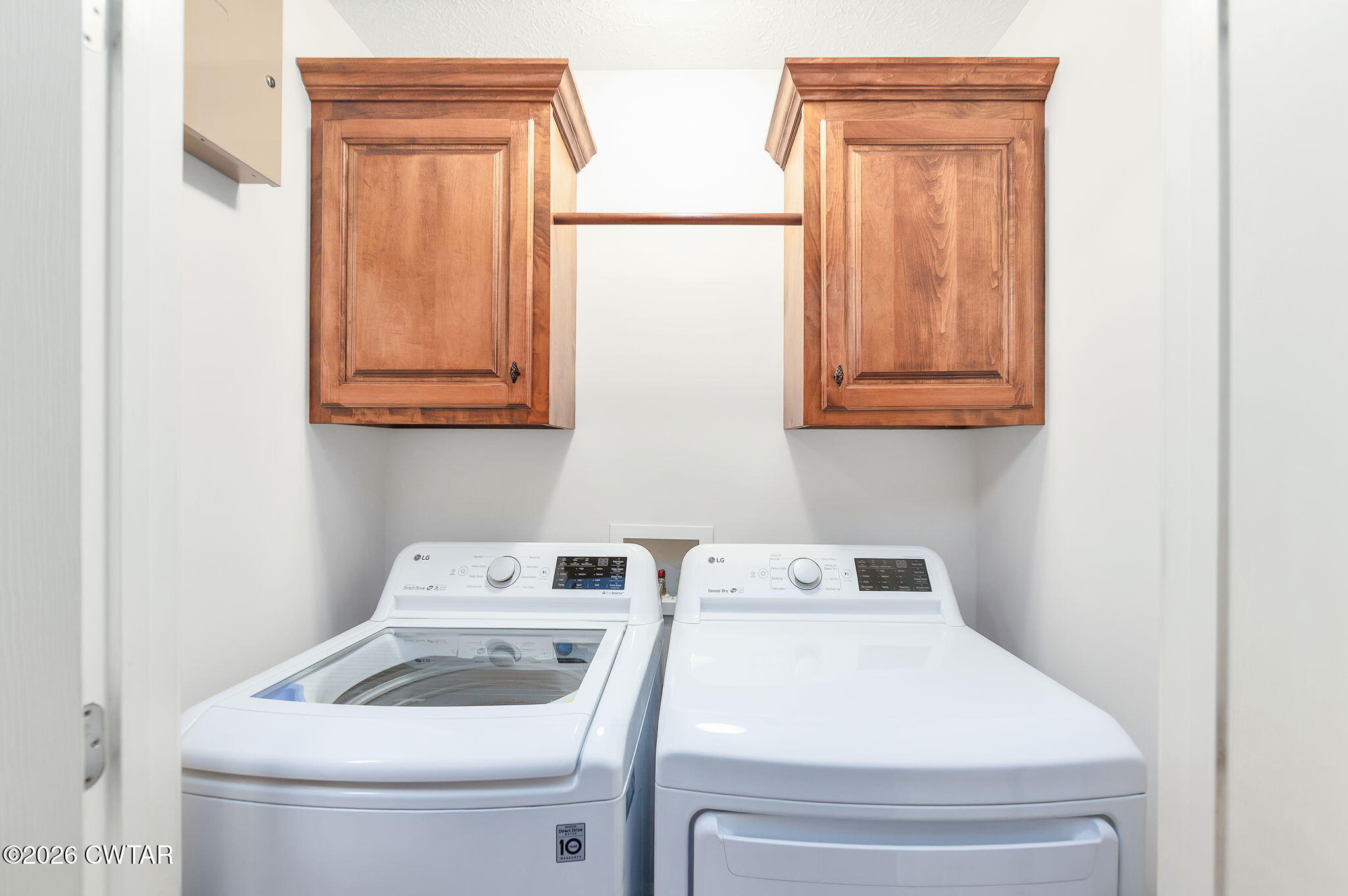 9 Sandbourne Cove Jackson, TN 38305 - Photo 17 of 22 a utility room with dryer and washer