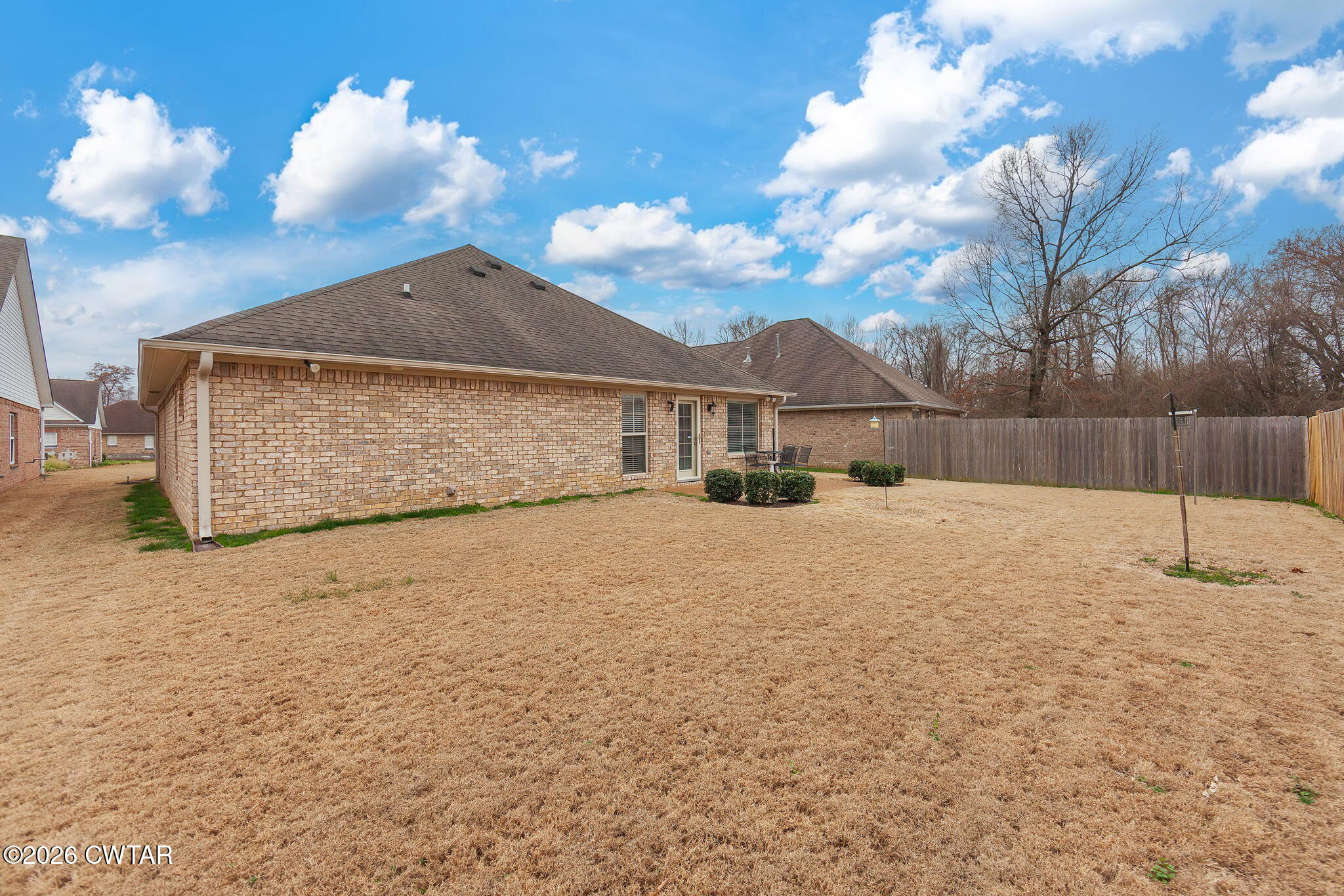 9 Sandbourne Cove Jackson, TN 38305 - Photo 19 of 22 a view of a backyard of a house