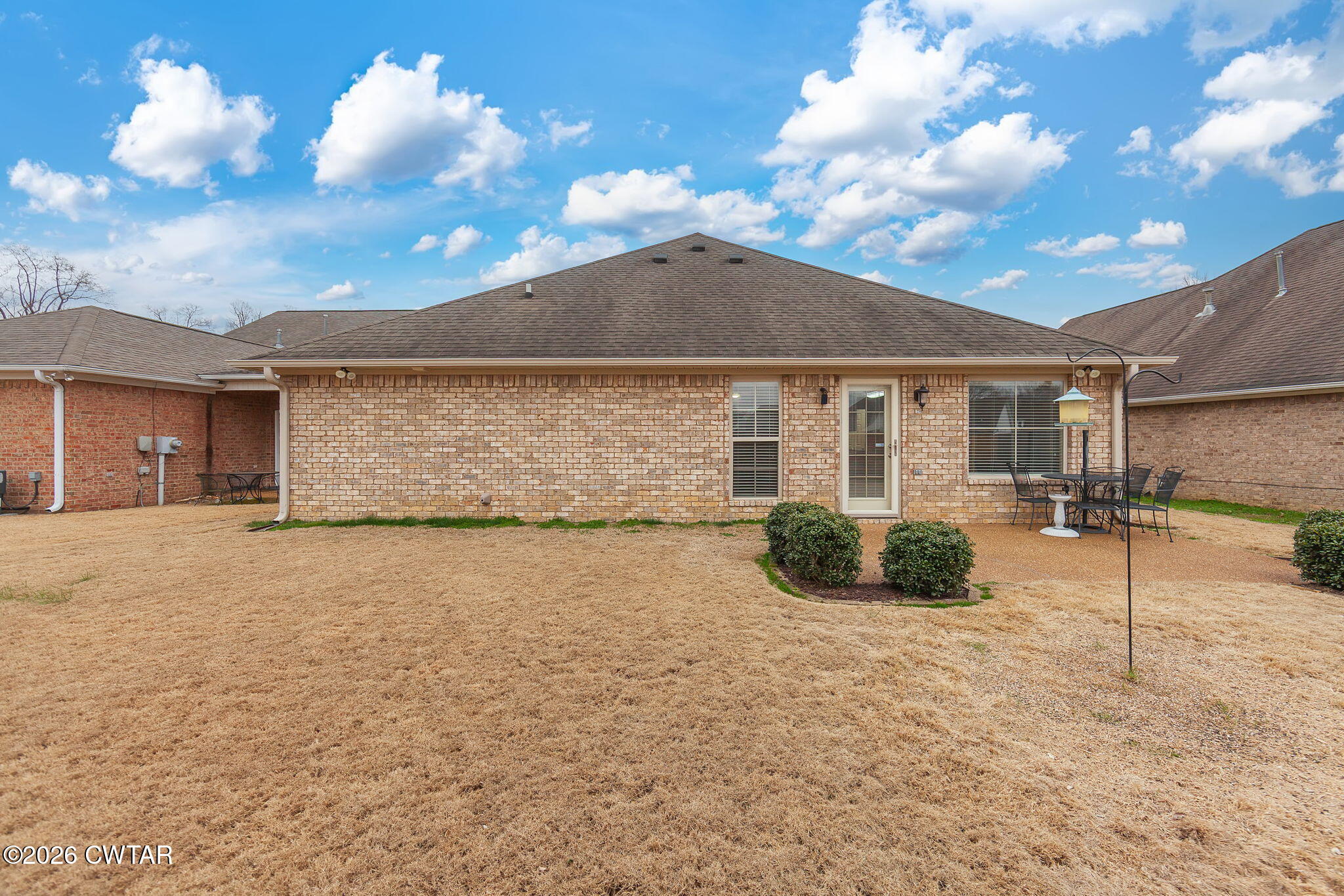 9 Sandbourne Cove Jackson, TN 38305 - Photo 20 of 22 a view of a house with a yard
