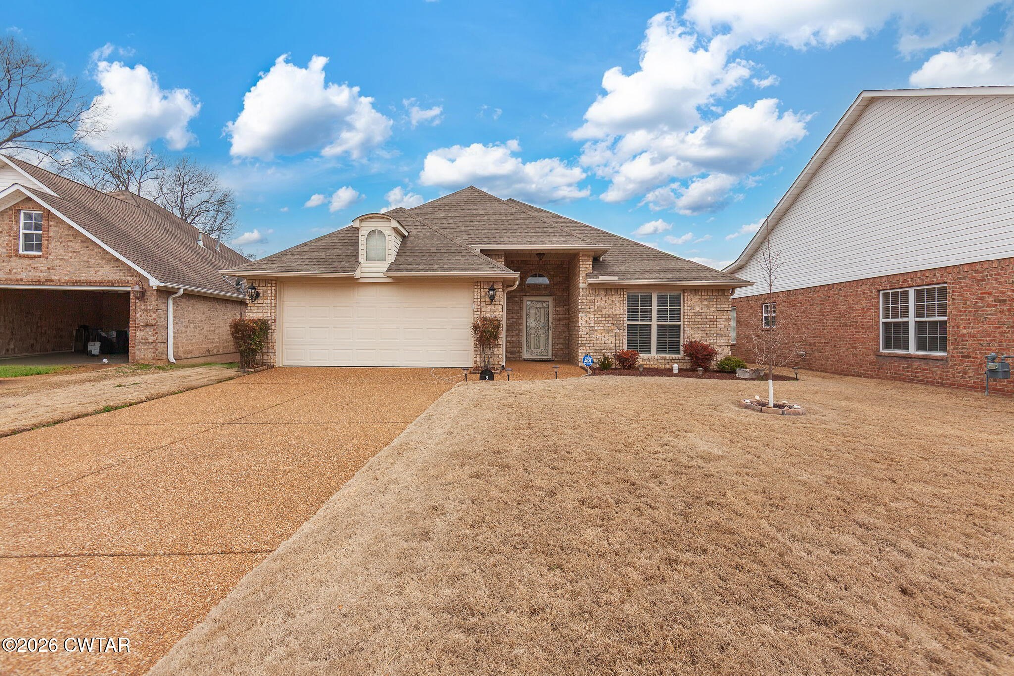 9 Sandbourne Cove Jackson, TN 38305 - Photo 22 of 22 a view of a house with a yard
