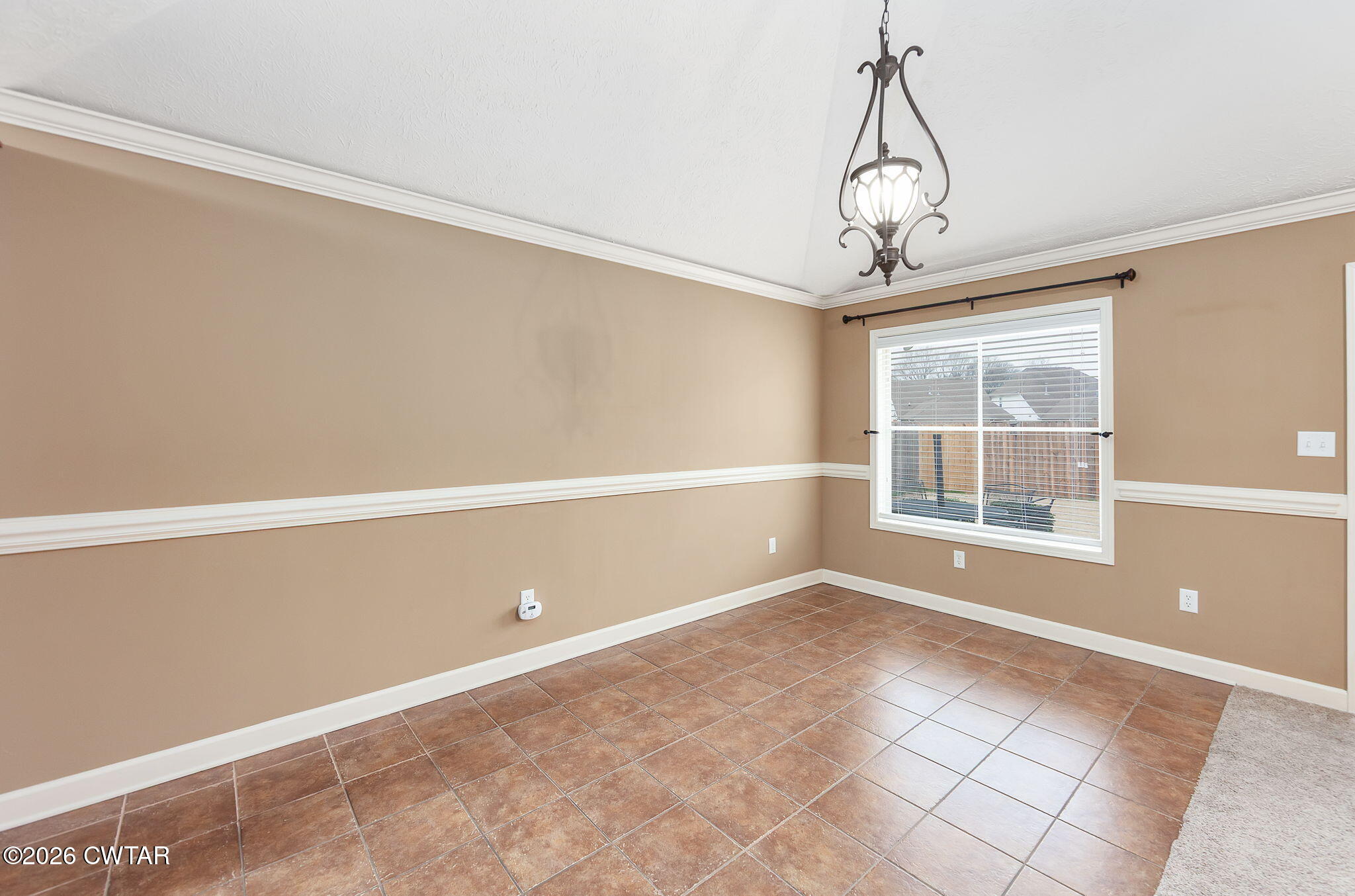 9 Sandbourne Cove Jackson, TN 38305 - Photo 8 of 22 a view of an empty room with a window