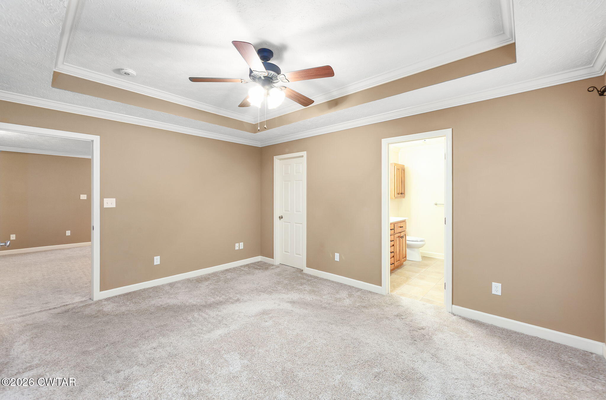9 Sandbourne Cove Jackson, TN 38305 - Photo 9 of 22 a view of an empty room and window ceiling fan