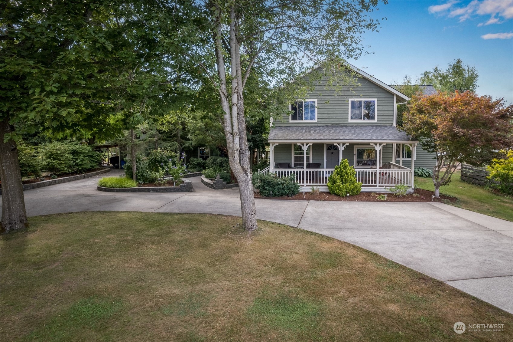 6283 Noon Road Everson, WA 98247 - Photo 1 of 40 a view of house with a yard and a garden