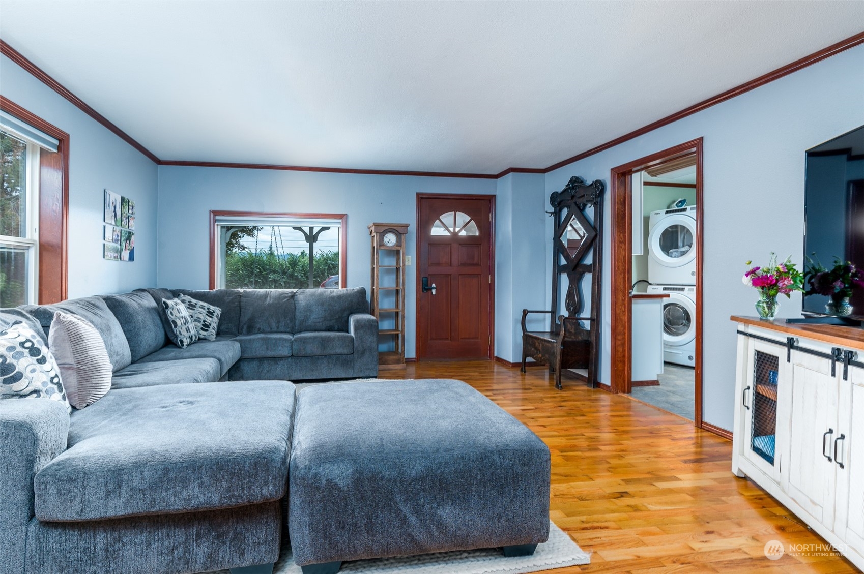 6283 Noon Road Everson, WA 98247 - Photo 11 of 40 a living room with furniture and a flat screen tv