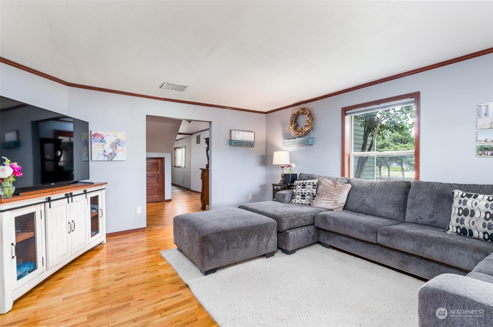 6283 Noon Road Everson, WA 98247 - Photo 12 of 40 a living room with furniture and a flat screen tv
