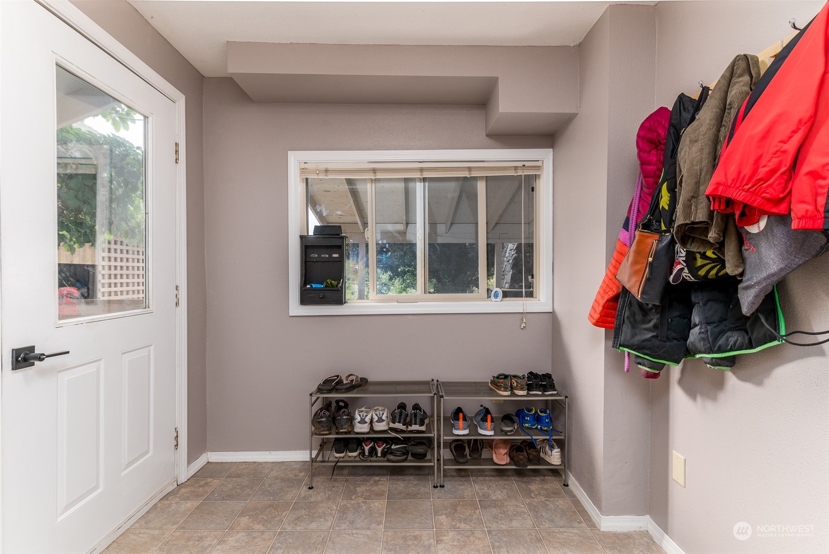 6283 Noon Road Everson, WA 98247 - Photo 19 of 40 a view of walk in closet with clothes and shoes
