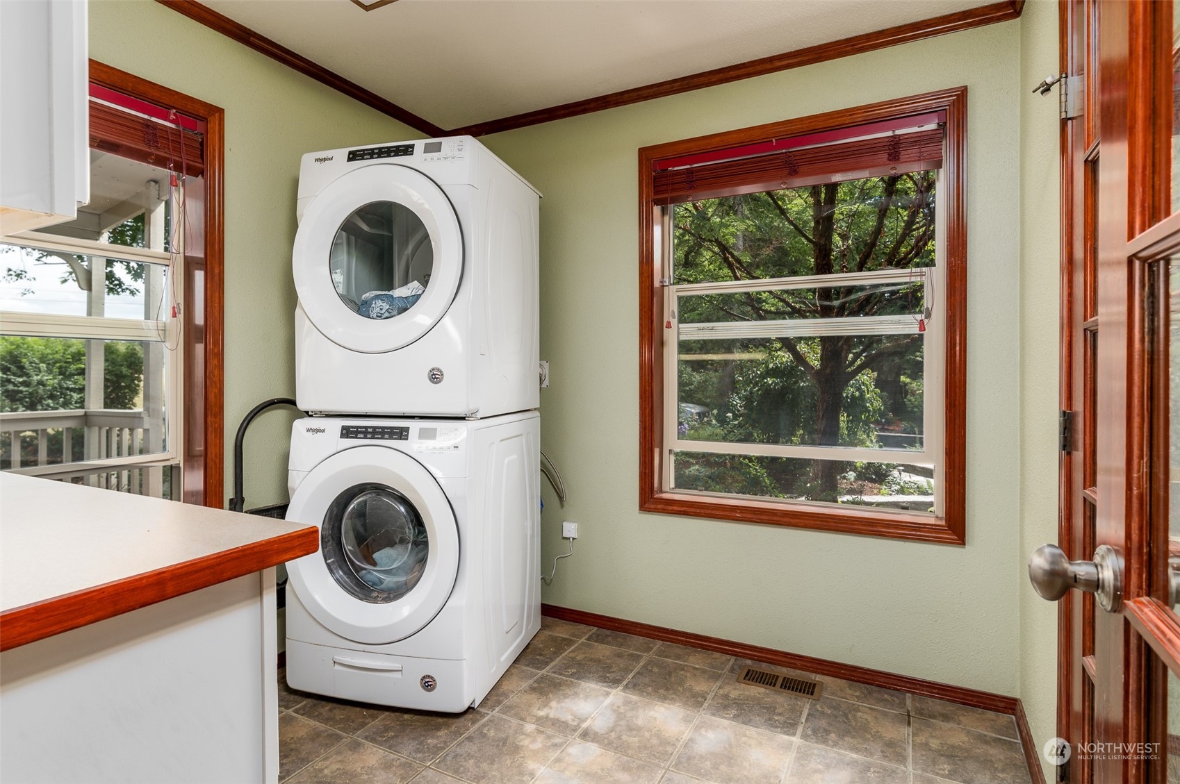 6283 Noon Road Everson, WA 98247 - Photo 25 of 40 a view of a storage and utility room with washer and dryer