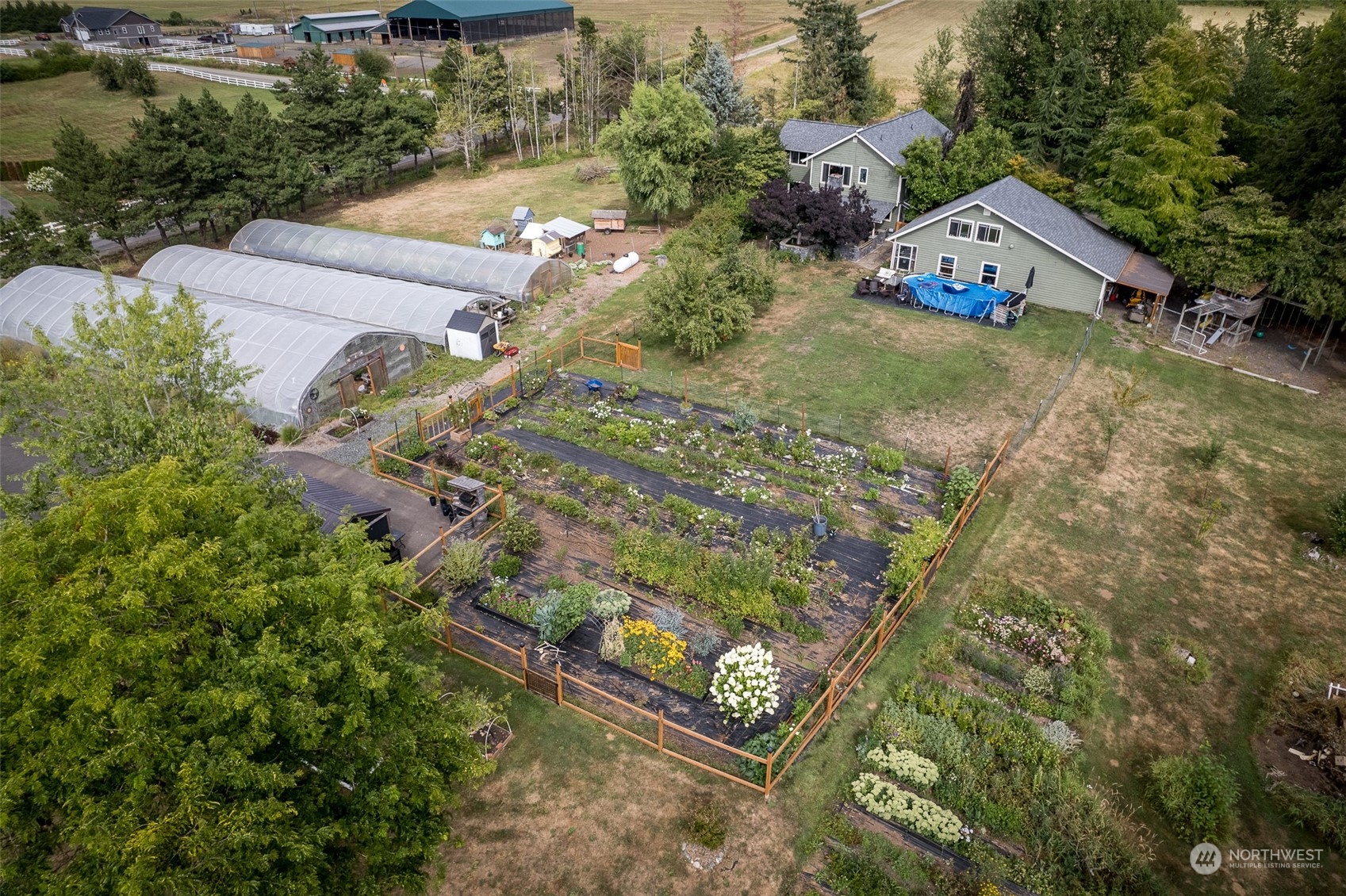 6283 Noon Road Everson, WA 98247 - Photo 36 of 40 an aerial view of residential house with outdoor space and trees all around