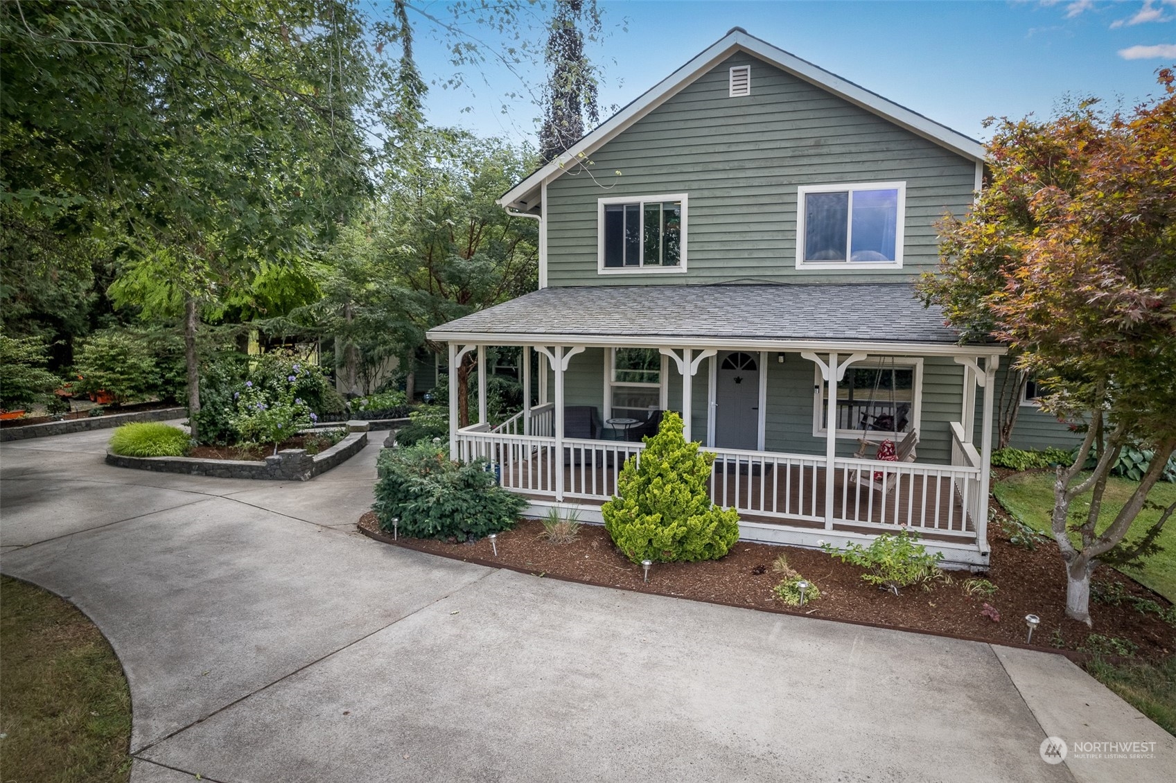 6283 Noon Road Everson, WA 98247 - Photo 39 of 40 a front view of a house with a garden