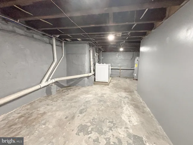 a view of a building with wooden fence