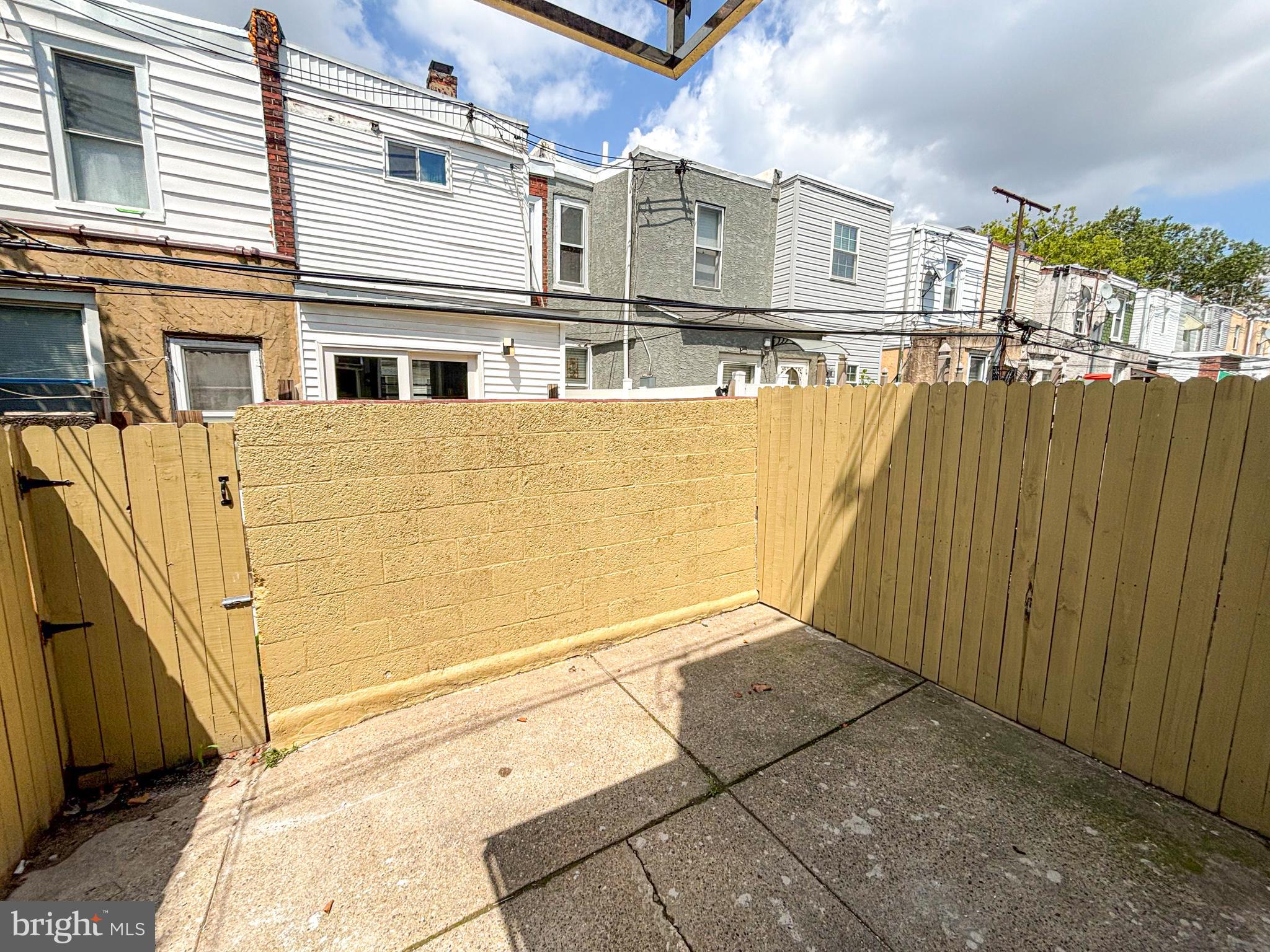 3631 Reed Street Philadelphia, PA 19146 - Photo 21 of 21 a view of a building with wooden fence
