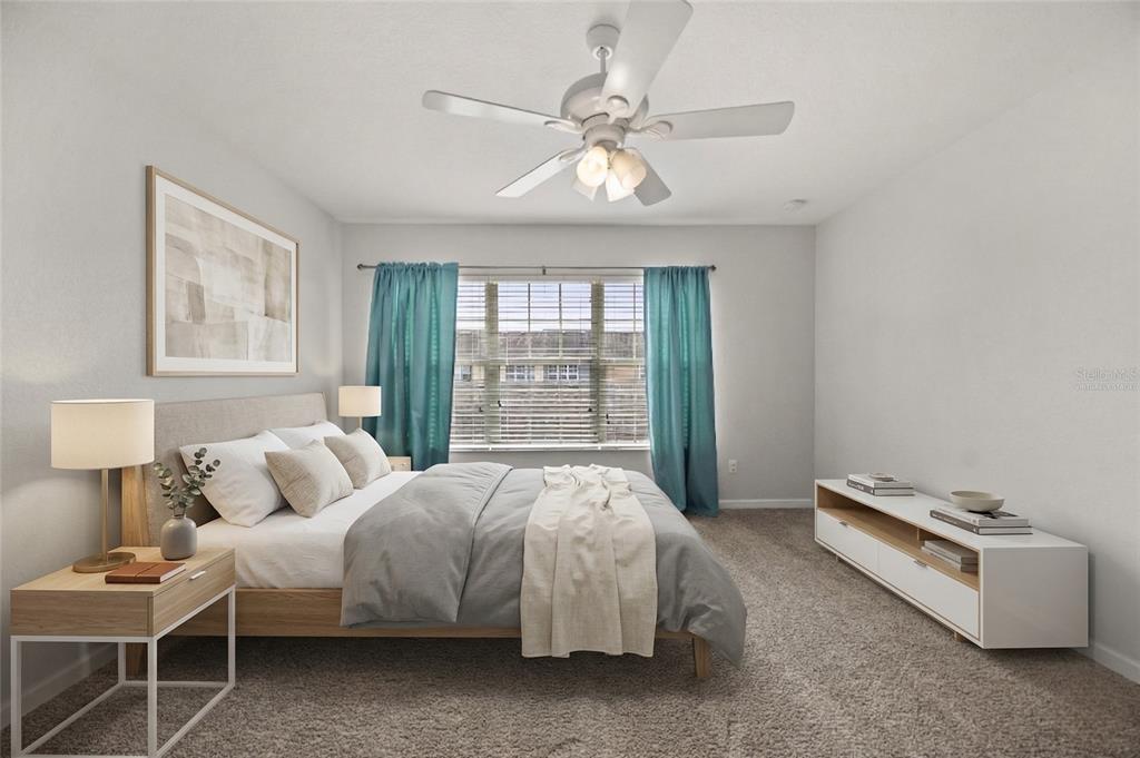 7719 Anselmo Lane Windermere, FL 34786 - Photo 14 of 31 a bedroom with a bed and a window