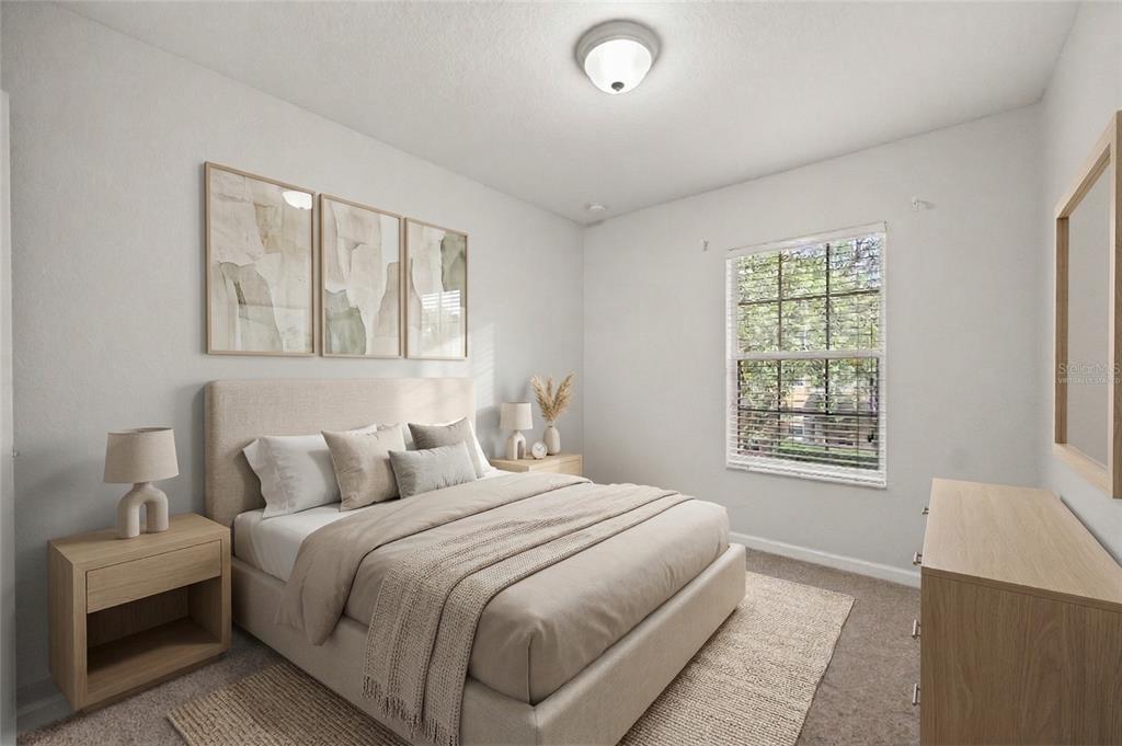 7719 Anselmo Lane Windermere, FL 34786 - Photo 20 of 31 a bedroom with a large bed and a window