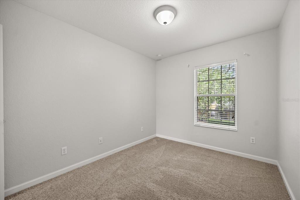 7719 Anselmo Lane Windermere, FL 34786 - Photo 21 of 31 an empty room with a window