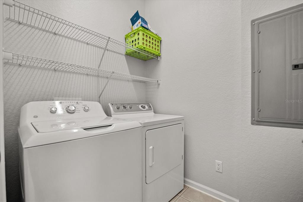 7719 Anselmo Lane Windermere, FL 34786 - Photo 27 of 31 a utility room with dryer and washer