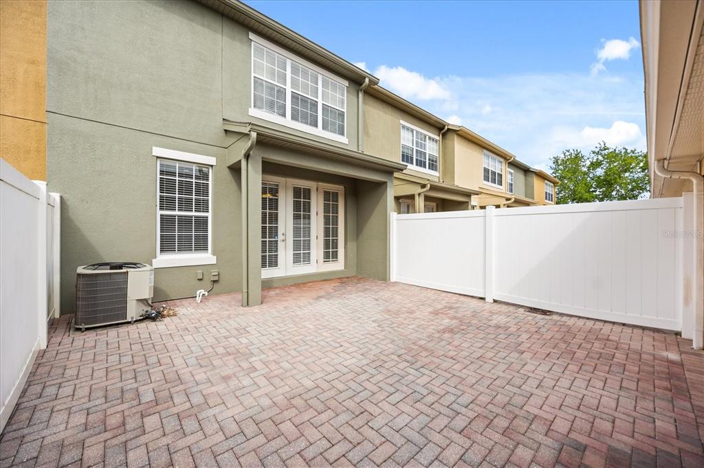 7719 Anselmo Lane Windermere, FL 34786 - Photo 29 of 31 a front view of a house with a yard