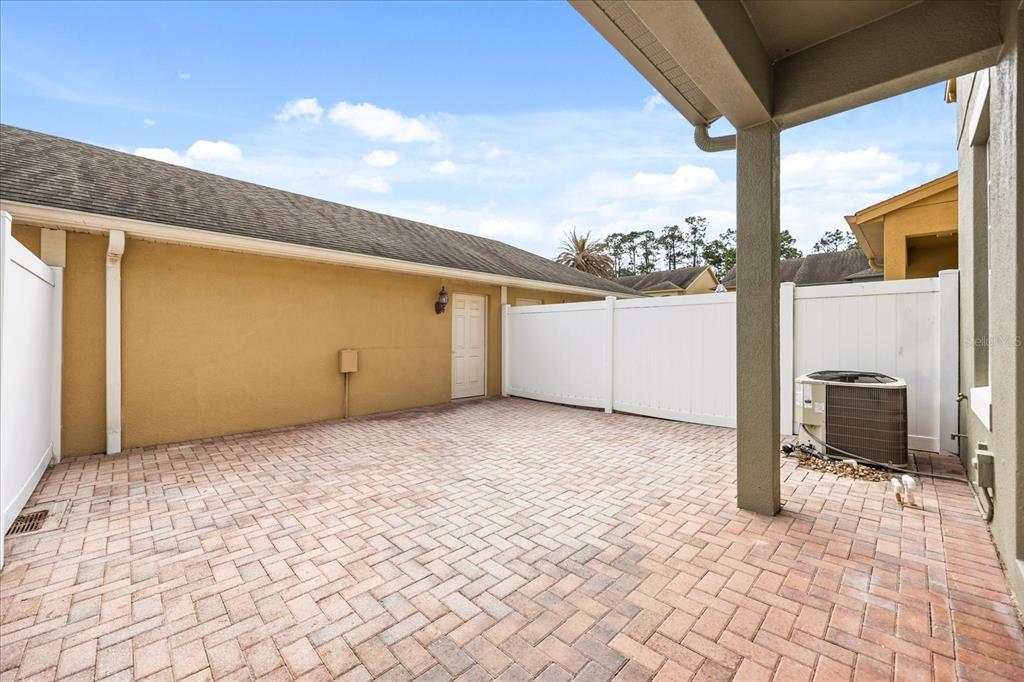 7719 Anselmo Lane Windermere, FL 34786 - Photo 30 of 31 a view of a backyard of a house