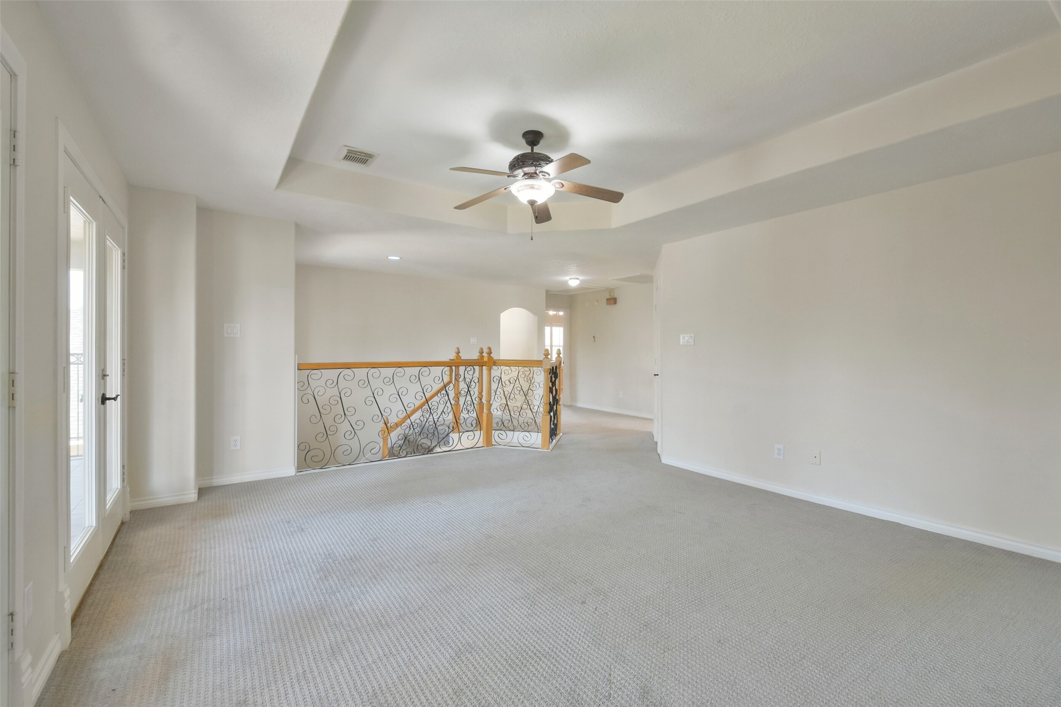 8114 Hideaway Lake Circle Spring, TX 77389 - Photo 26 of 50 a view of an empty room and a ceiling fan window