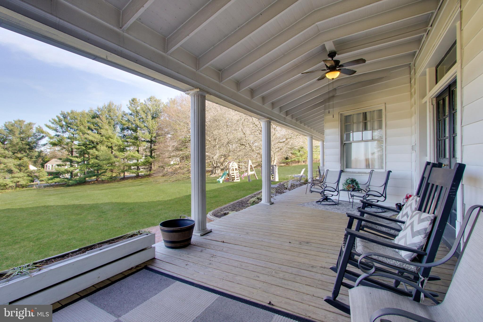 1011 South Rolling Road Baltimore, MD 21228 - Photo 15 of 42 Rear porch located off main level