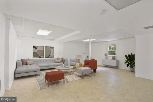 a living room with furniture and a couch