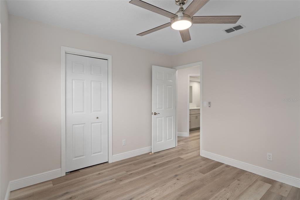 10352 Brentlawn Street Spring Hill, FL 34608 - Photo 24 of 35 wooden floor in an empty room