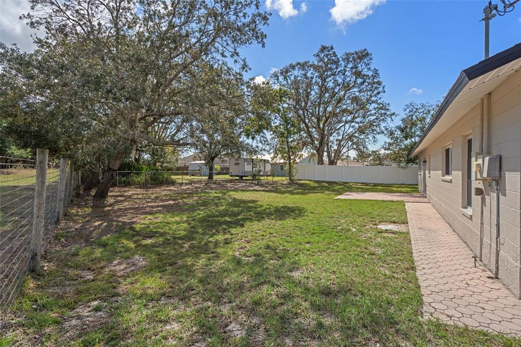 10352 Brentlawn Street Spring Hill, FL 34608 - Photo 31 of 35 a view of outdoor space with garden
