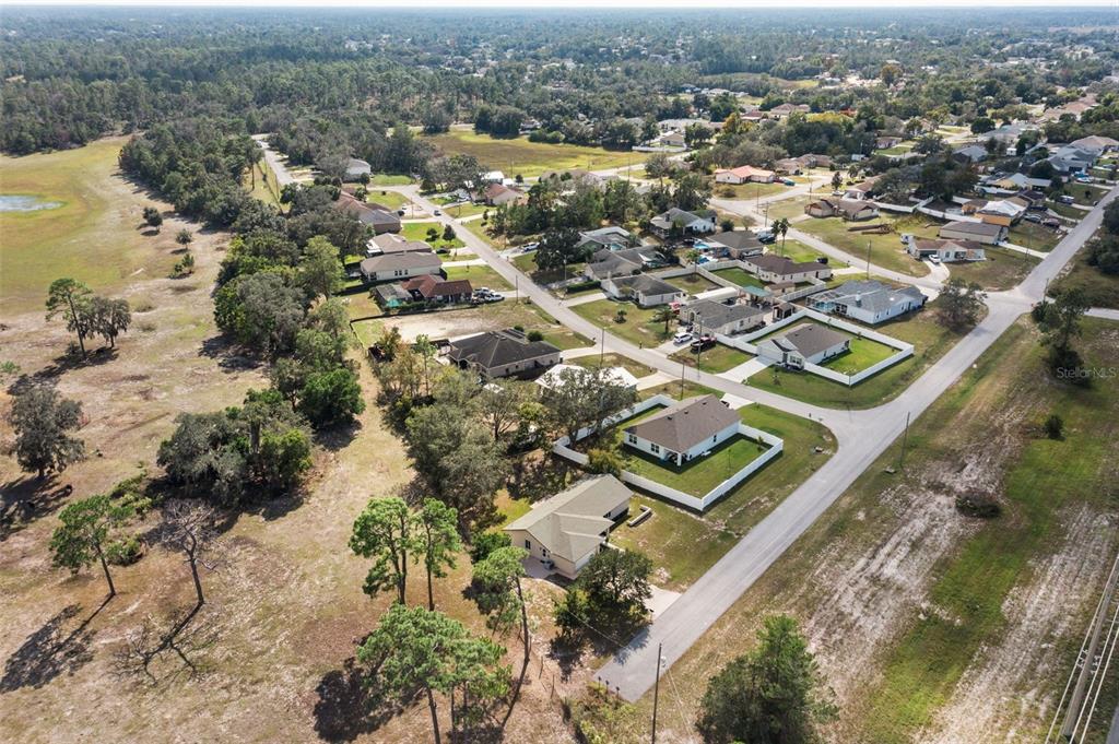 10352 Brentlawn Street Spring Hill, FL 34608 - Photo 34 of 35 an aerial view of residential houses with outdoor space
