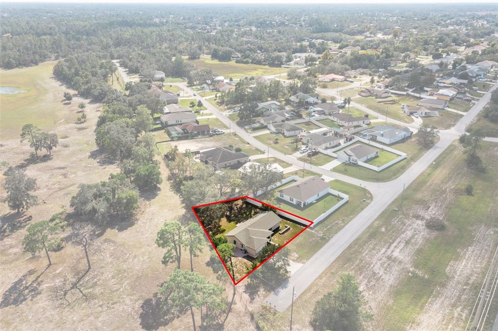 10352 Brentlawn Street Spring Hill, FL 34608 - Photo 35 of 35 an aerial view of residential houses with outdoor space