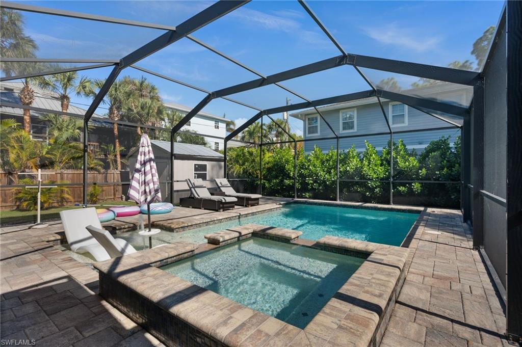 723 Park Avenue Naples, FL 34110 - Photo 1 of 48 a view of a backyard with sitting area
