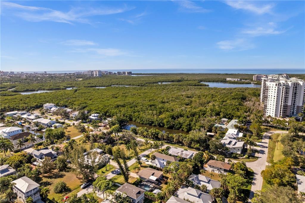 723 Park Avenue Naples, FL 34110 - Photo 13 of 48 an aerial view of residential building and lake