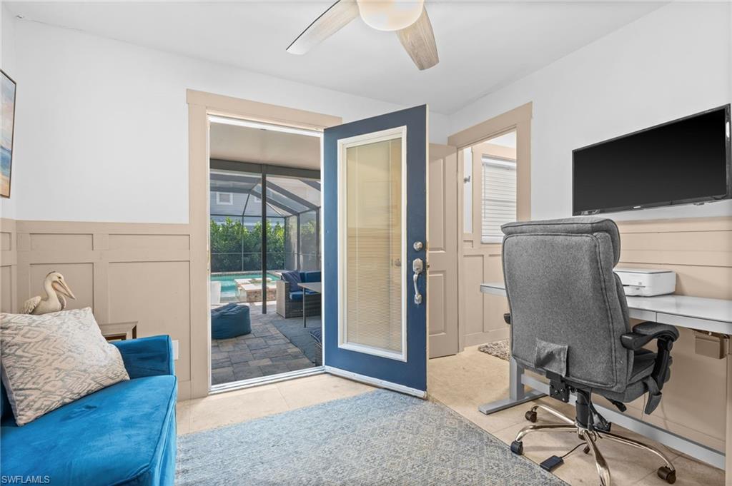 723 Park Avenue Naples, FL 34110 - Photo 20 of 48 a view of a livingroom with workspace and a couch
