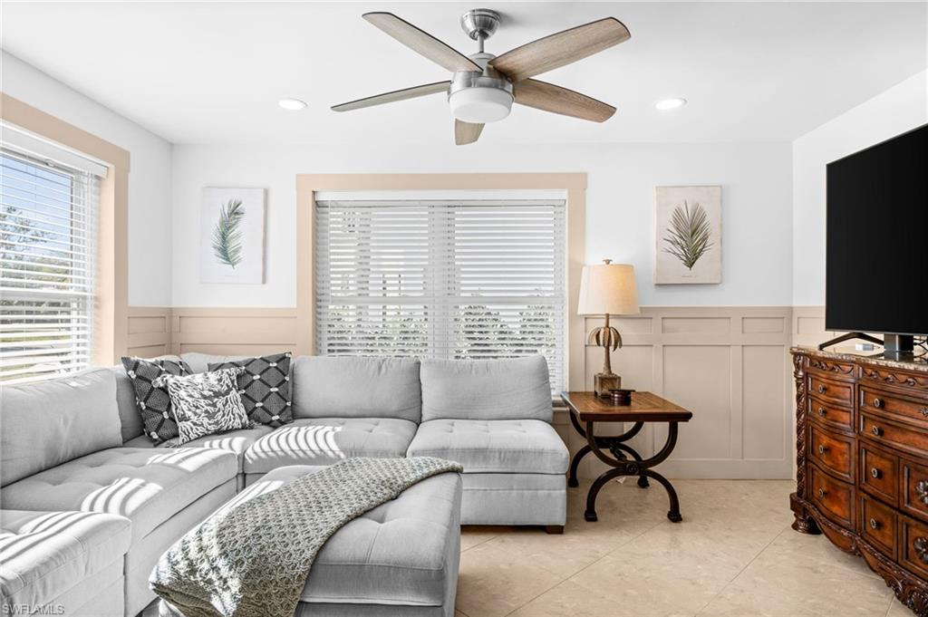 723 Park Avenue Naples, FL 34110 - Photo 30 of 48 a bedroom with furniture and a window