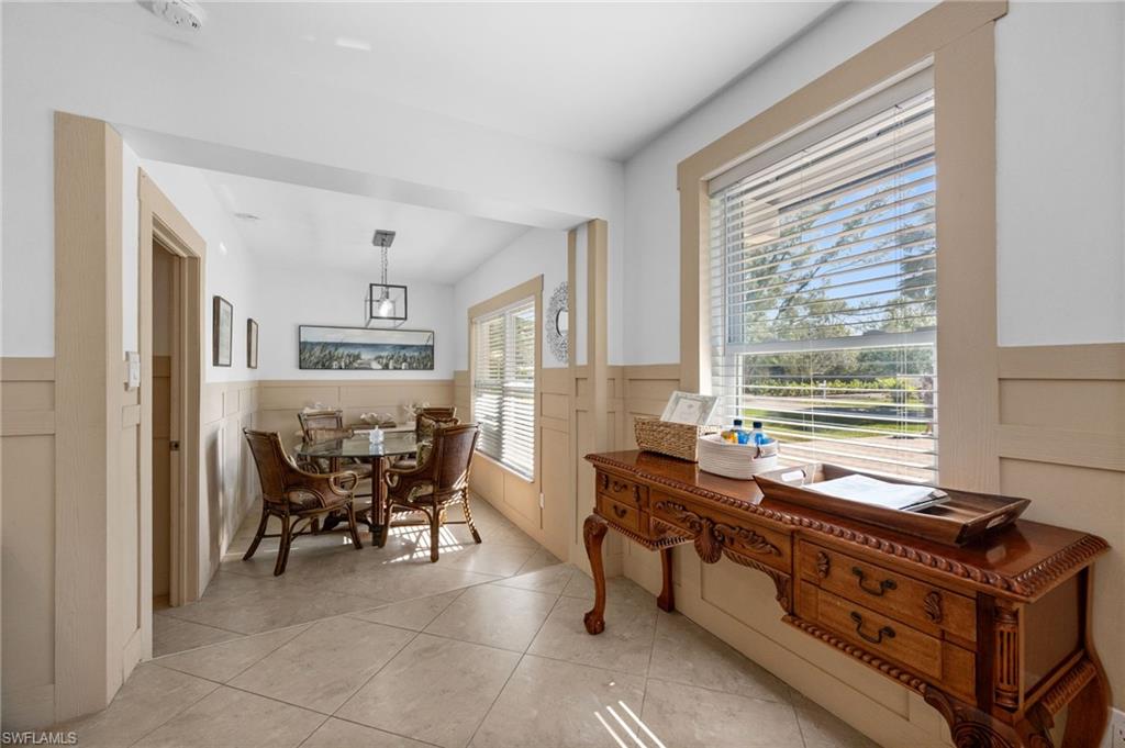 723 Park Avenue Naples, FL 34110 - Photo 35 of 48 a room with furniture and window