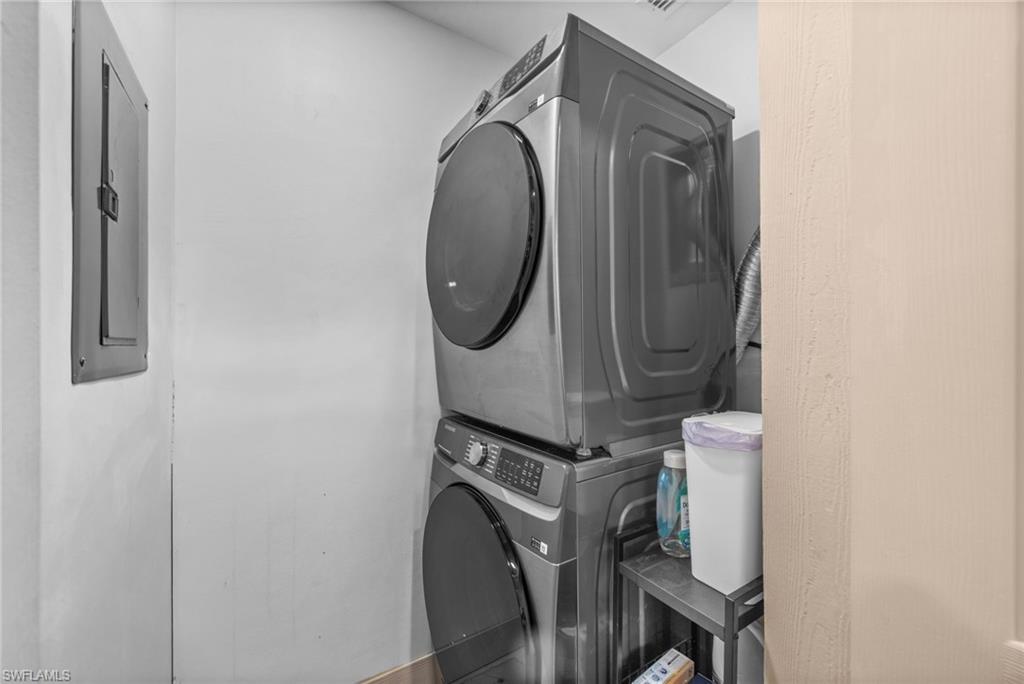 723 Park Avenue Naples, FL 34110 - Photo 41 of 48 a close view of utility room with washer and dryer
