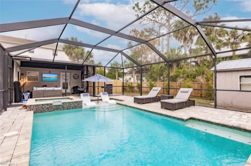 723 Park Avenue Naples, FL 34110 - Photo 48 of 48 a view of a backyard with swimming pool